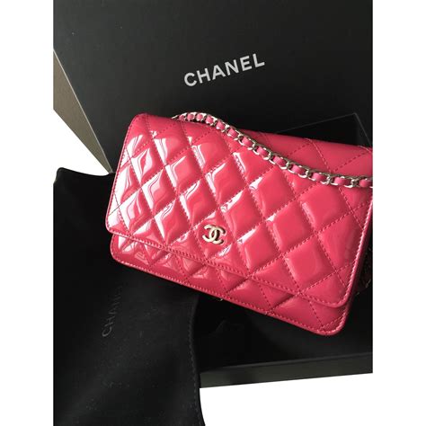 chanel pink wallet on a chain